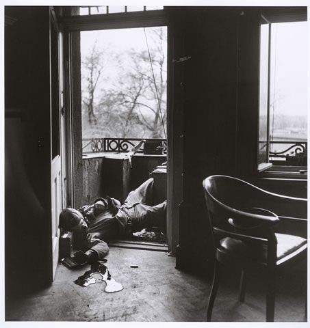 ROBERT CAPA: American soldier killed by German snipers, Leipzig, Germany. April 18, 1945. Gelatin silver print.